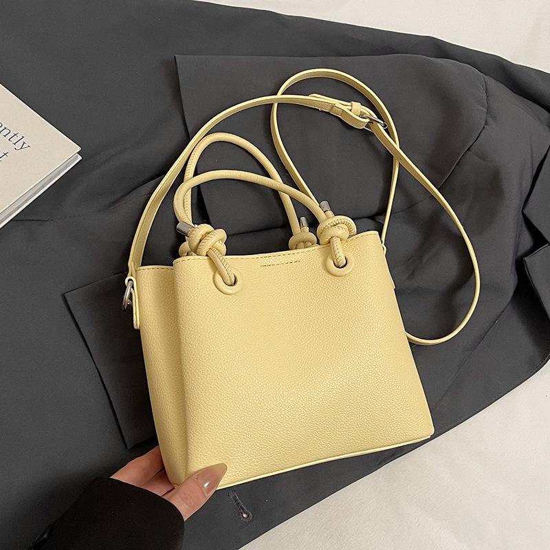 2025 New Simple Solid Color High-end Portable Bucket Bag Spring and Summer New Versatile Casual Commuter Messenger Bag