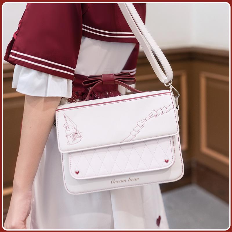 Elegant kremfarget bjørnedress i collegestil for jenter - Komplett sett