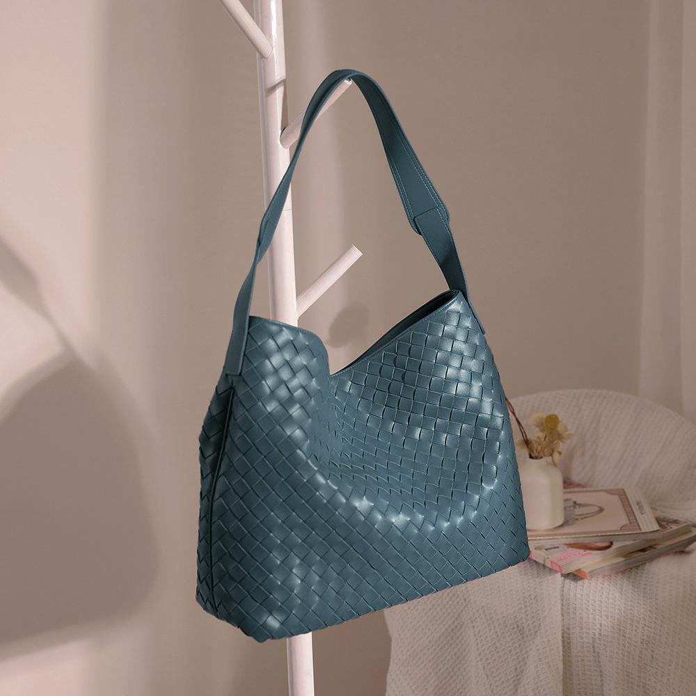 Bolsa feminina de couro explosiva transfronteiriça, bolsa tote tecida simples e moderna, bolsa de mão com ombro de grande capacidade, couro bovino feminino