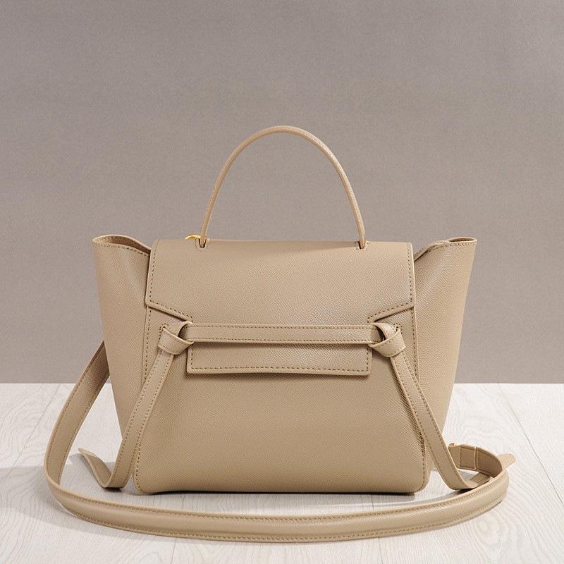 

Женская сумка через плечо из натуральной кожи большой вместимости - сумка-смайл с крыльями и рисунком в виде сомика