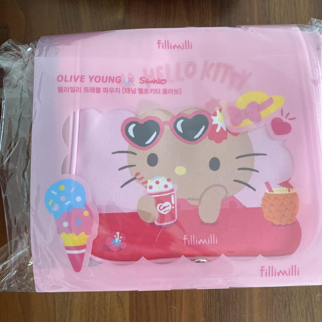 

[USED] Olive Young Exclusive Tanned Hello Kitty Travel Pouch (Korea)
