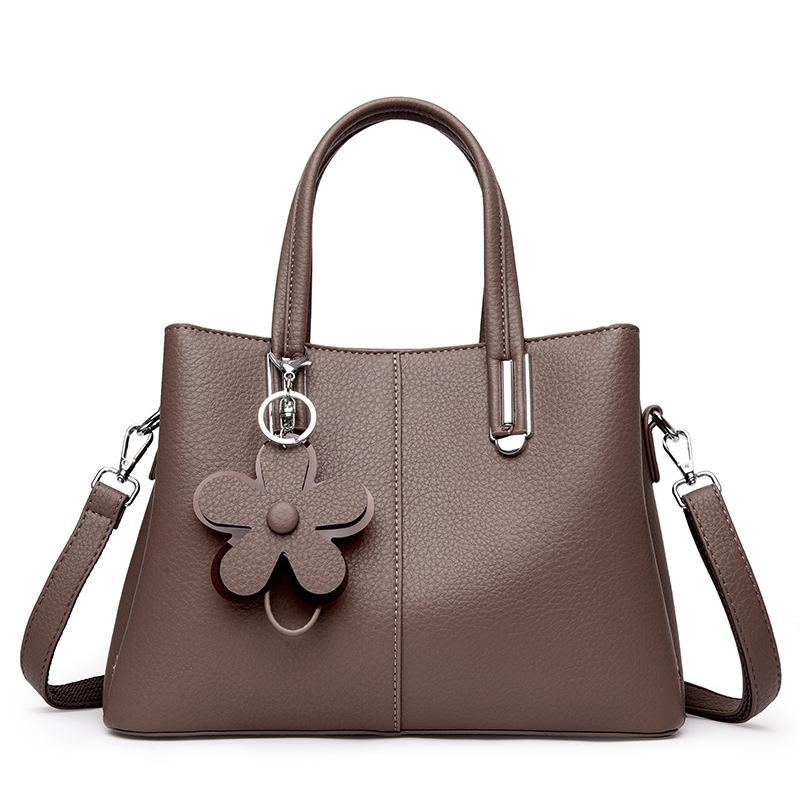 

Версія жіночої сумки Модна сумочка великої ємності через плече для матері