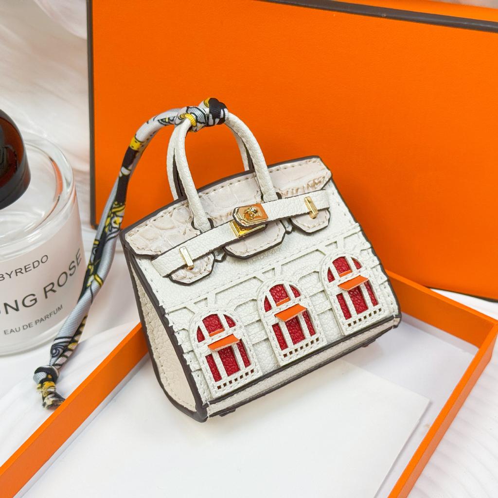 Neuer modischer Mini-Kleinhäuser-Taschenanhänger kleine Tasche süßer Taschenanhänger Mund roter Umschlag Kopfhörertasche Autoschlüsselanhänger