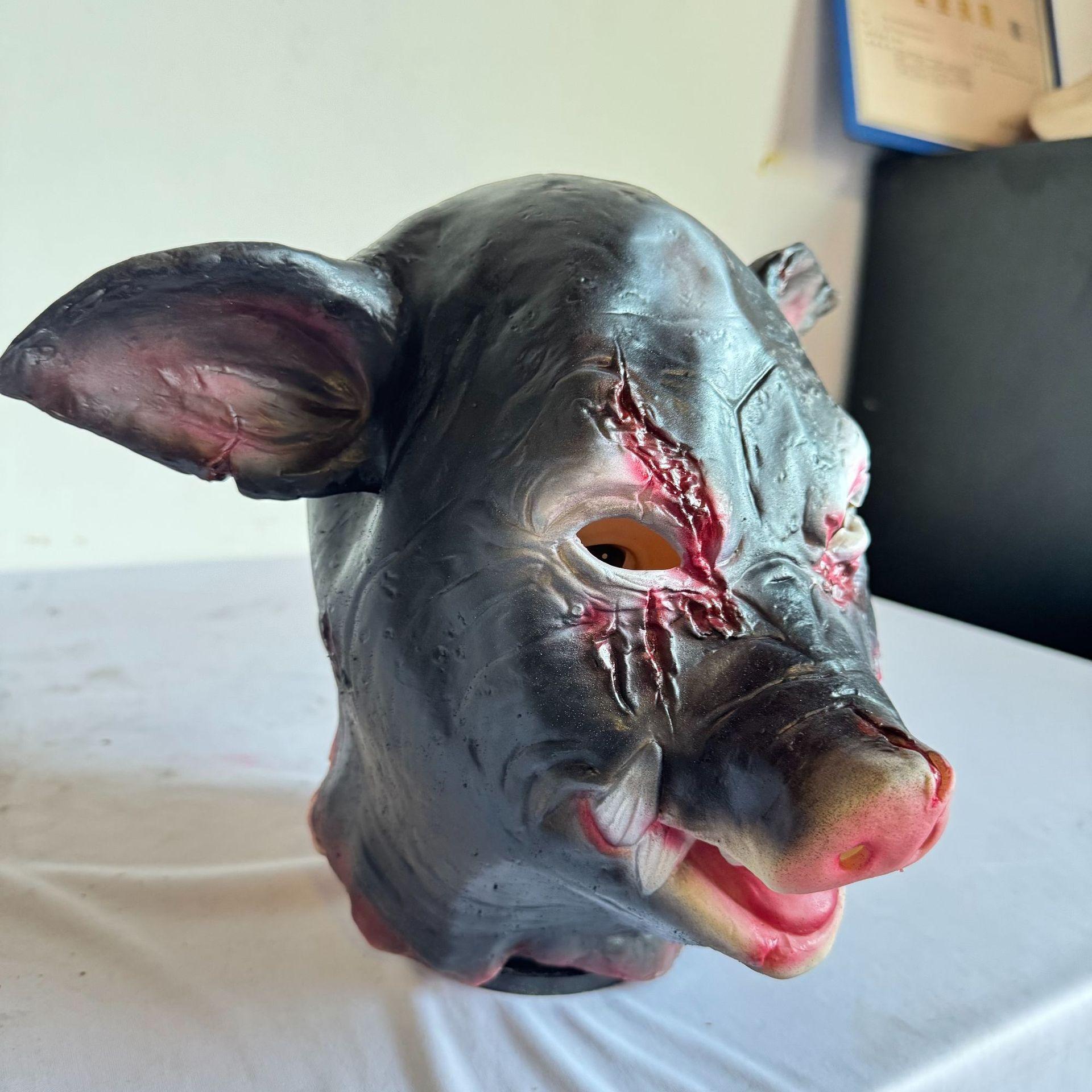 Scarred charcoal black pig head latex mask One size fits all adults чёрный