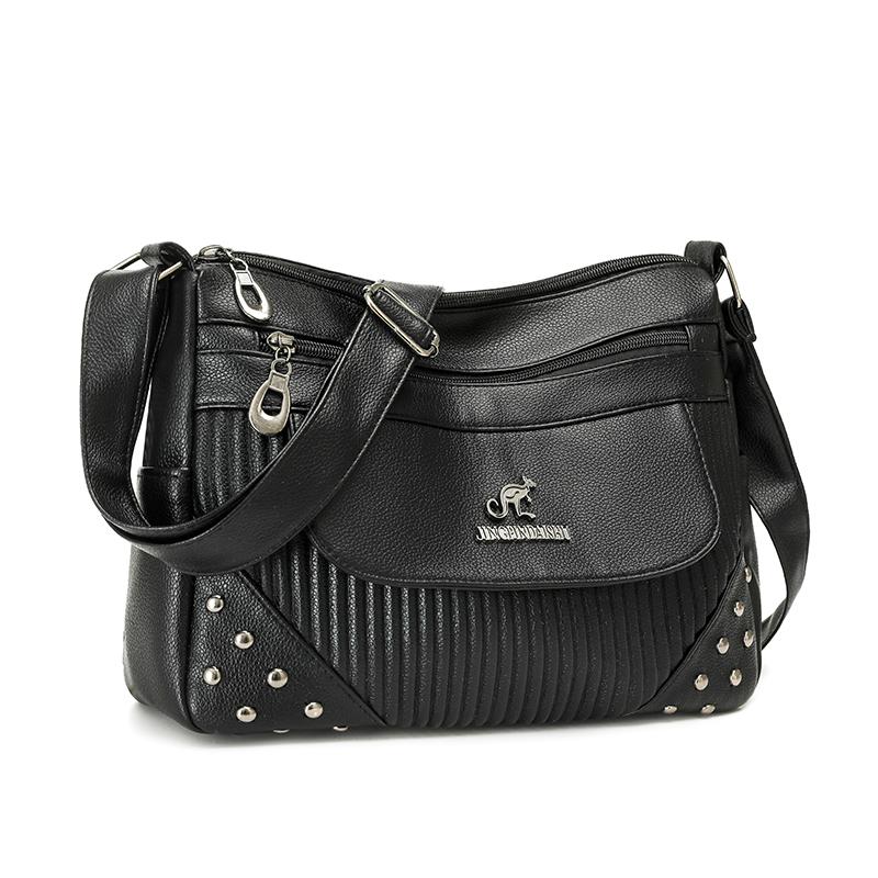 Einfarbige Damen Crossbody-Tasche mit geripptem Panel und Nieten-Details Elegante Kunstleder-Umhängetasche für den täglichen Gebrauch