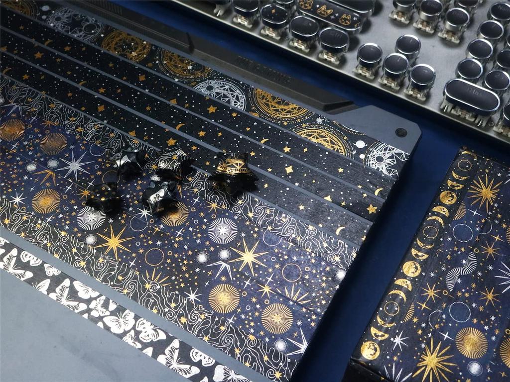 YUBBAEX 9 Rolls of Mysterious Space Masking Foil Super Perfect for Gift DIY and Notebook Decor Tape, Wide, Silver/Gold Stamping, Cute, Thin, Wrapping,