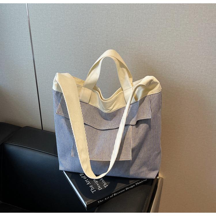 New fashionable high-value large-capacity tote bag shoulder cloth bag women's commuter fashion multi-pocket