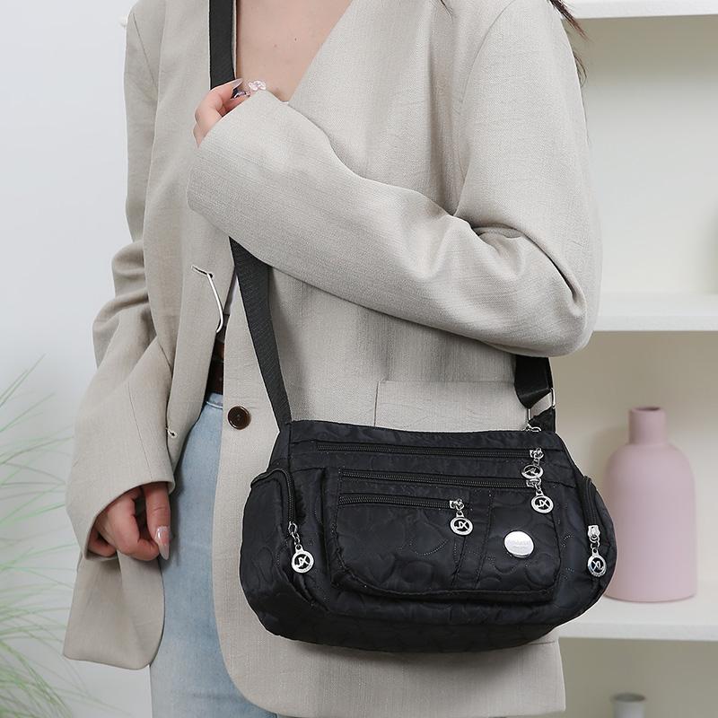 Bag Women's Large Capacity Shoulder Bag Waterproof and Wear Resistant Multi Pocket Commuter Leisure Outdoor Crossbody Bag