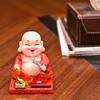 Home Decor – Solar Buddha Monk with Moving Head & Hand Holding Money Potli | Feng Shui Good Luck - Idol for Car