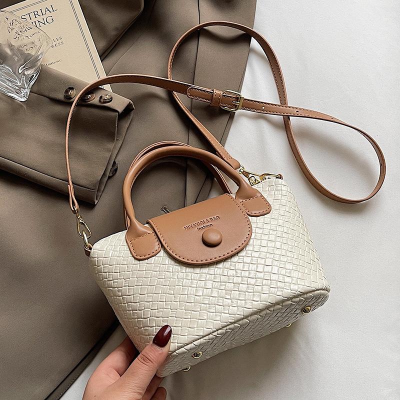 Spring Hot Sale Korean Casual Commuter Style High-end Sense Portable Bucket Bag Weaving Pattern Contrasting Color Versatile Messenger Bag Women