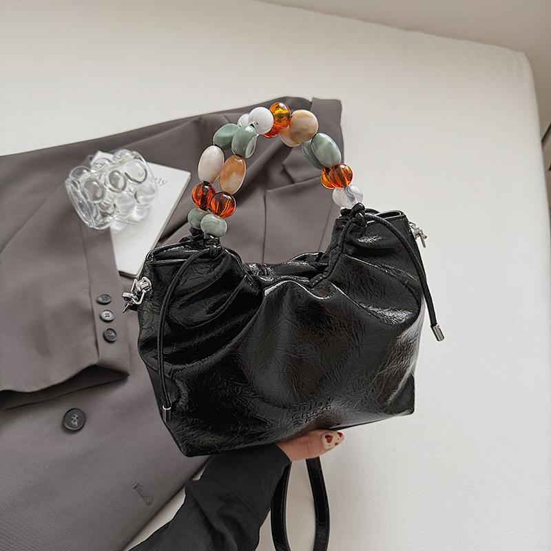 New Chinese bag women's handbag 2025 new summer fashion niche casual bucket bag beaded messenger bag