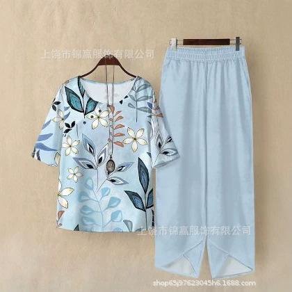 Spring and summer national style bamboo leaf plant printed women's clothing, breathable round neck medium sleeve top, elastic waist loose eight-point