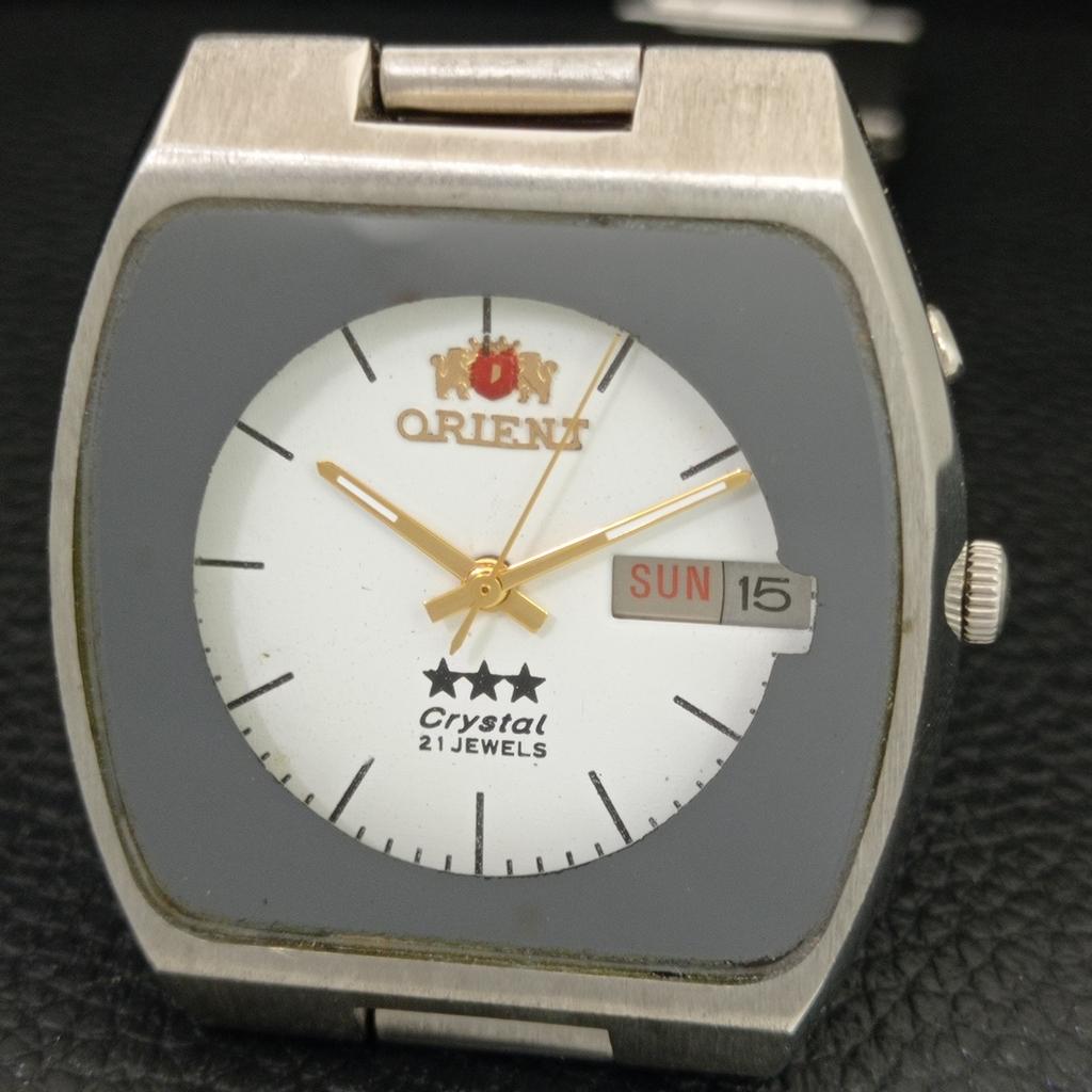 GENUINE 46941 VINTAGE ORIENT CRYSTAL AUTOMATIC JAPAN MENS WHITE WATCH a704888-1