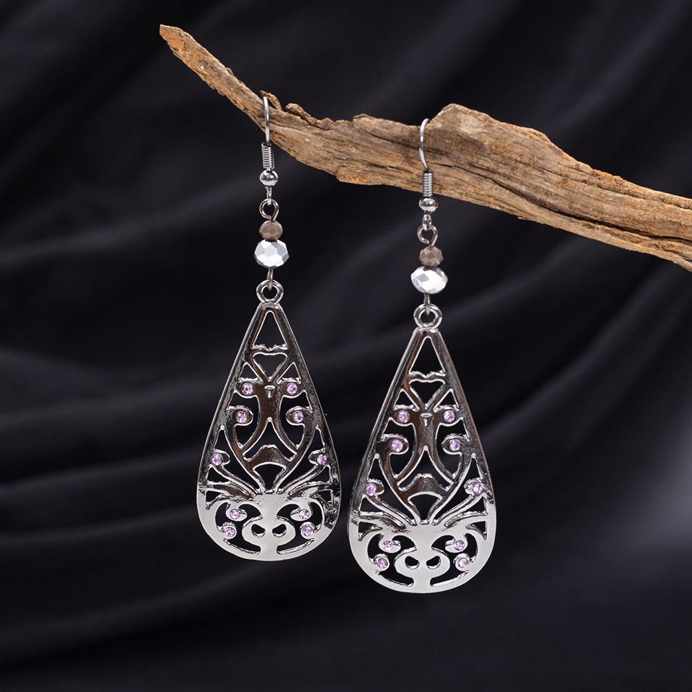 Retro Teardrop Earrings with Hollow Floral Design and Rhinestone Accents