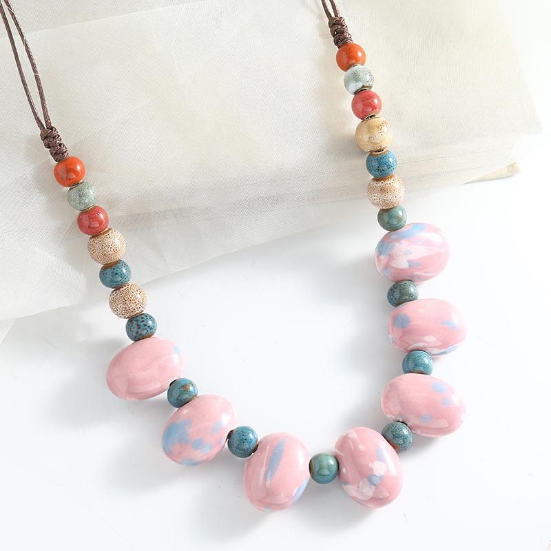 Ceramic axe pendant, long necklace, retro simple and versatile sweater chain.