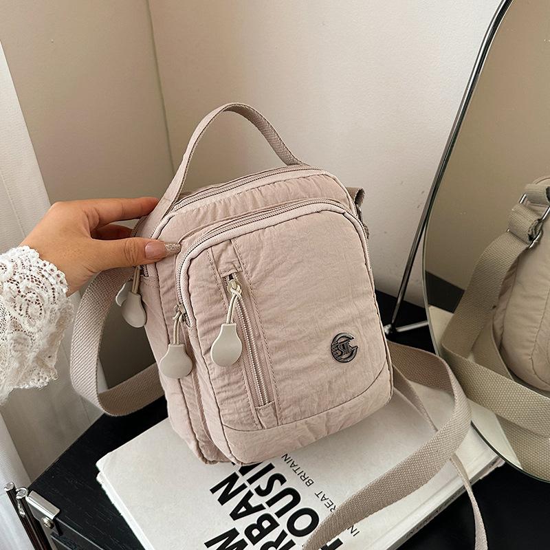 Niche versatile lightweight small cloth bag women's new outdoor leisure handbag shoulder messenger mobile phone bag