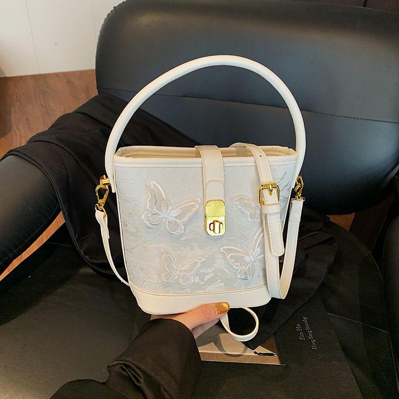 

Вдохновленная Мори, женская сумка-ведро кроссбоди высокой ценности - 2025 год, французский стиль, одобрено инфлюенсерами, универсальная вещь для поездок белый