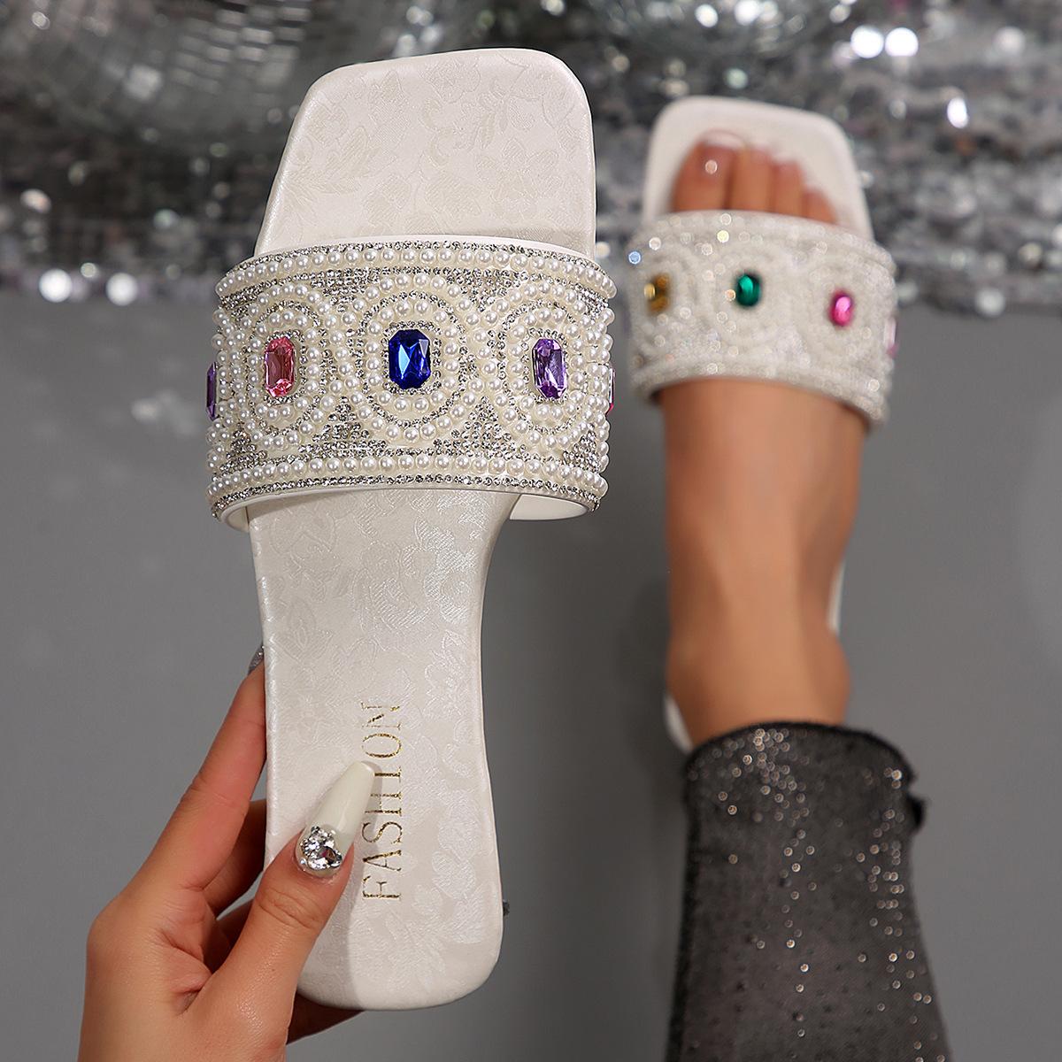 

Foreign trade large size colored rhinestone slippers women s 2025 summer new square head flat bottom one word casual beach cool slippers 42
