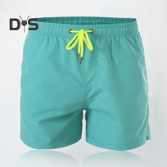 Léto Elastický pas Stahovací šňůrka Plážové surfovací šortky Síťovaná podšívka Kapsy Rychleschnoucí plavky