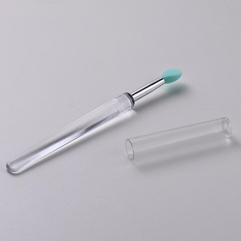 Silicone Lip and Eye Shadow Brush with Cover - Dustproof, Multifunctional, Portable and Sequin Design.