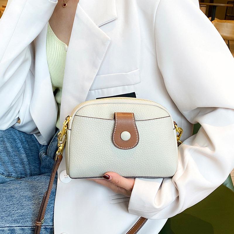 The First Layer of Cowhide Small Bag, the New Genuine Leather Women's Bag, Versatile Mobile Phone Bag, Niche Style Shoulder Messenger Bag.