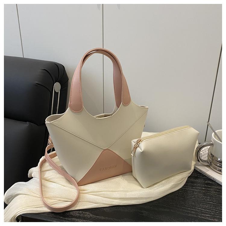 

2025 new niche design splicing fashion versatile messenger bag casual shoulder underarm bag portable bucket bag розовый