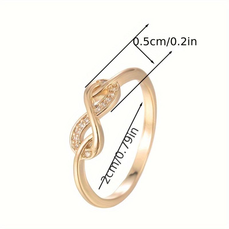 Bague tendance conçue dans un style en forme de 8 avec incrustation de zircones. Convient aux femmes