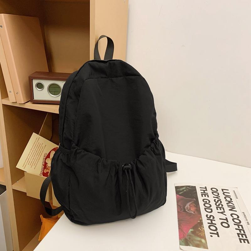 

New fashionable, lightweight and simple backpack, female Japanese literary and artistic student schoolbag, leisure sports travel, solid color backpack