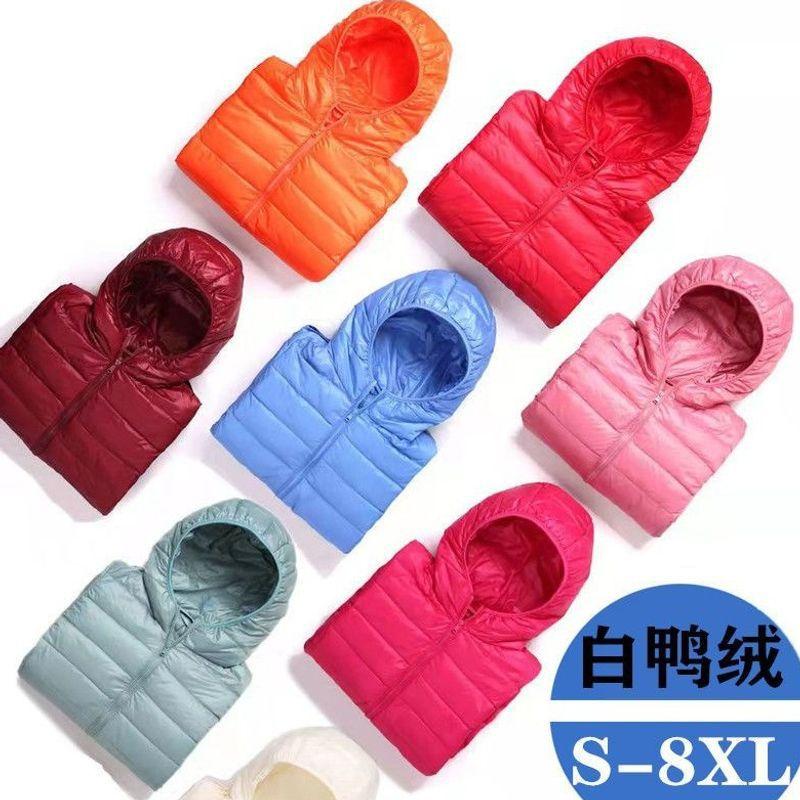 Light down jacket women's short stand-up collar hooded fashion autumn and winter thin large size women's clothing slim-fitting portable jacket