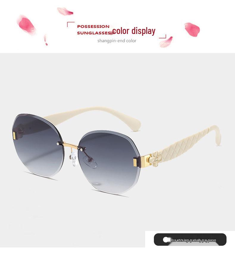 Women's Egg-Shaped Stylish Frameless Retro Sunglasses for Summer Photoshoots