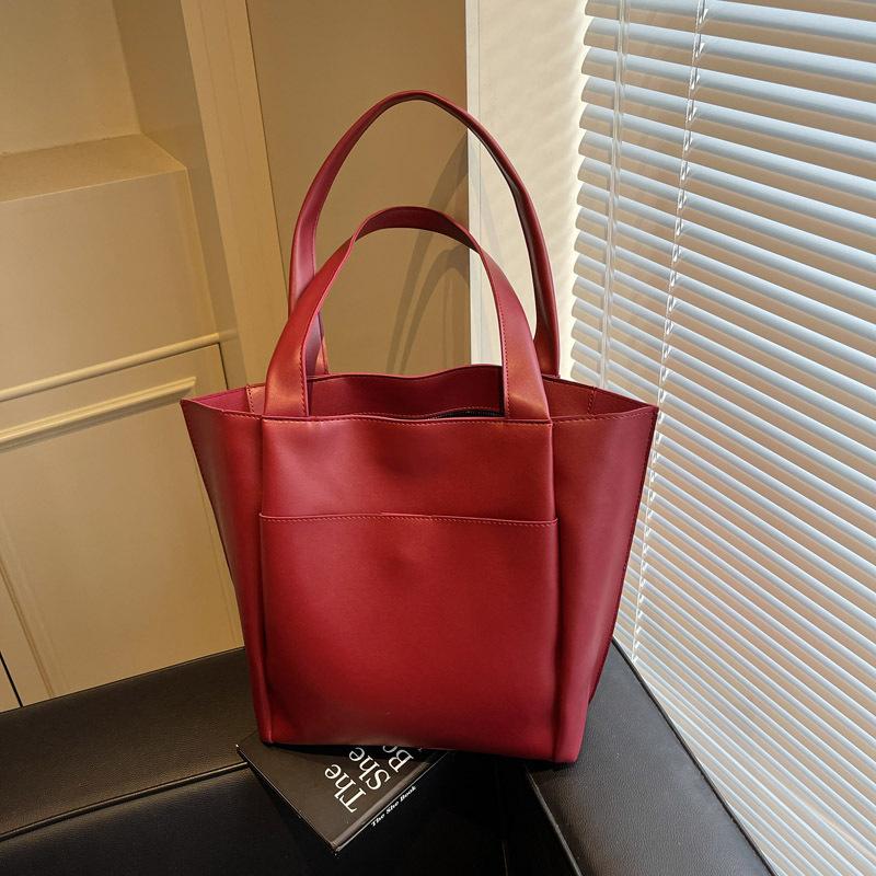 

Женская сумка-тоут большой вместимости, новая весенне-летняя, для通勤, на плечо, повседневная, модная, портативная, сумка-ведро бордовый