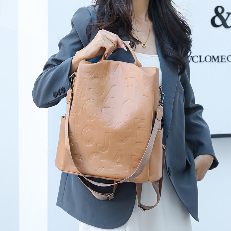 Large Capacity Backpack Women's Letter Backpack Soft Leather Travel Bag Multifunctional Shoulder Bag