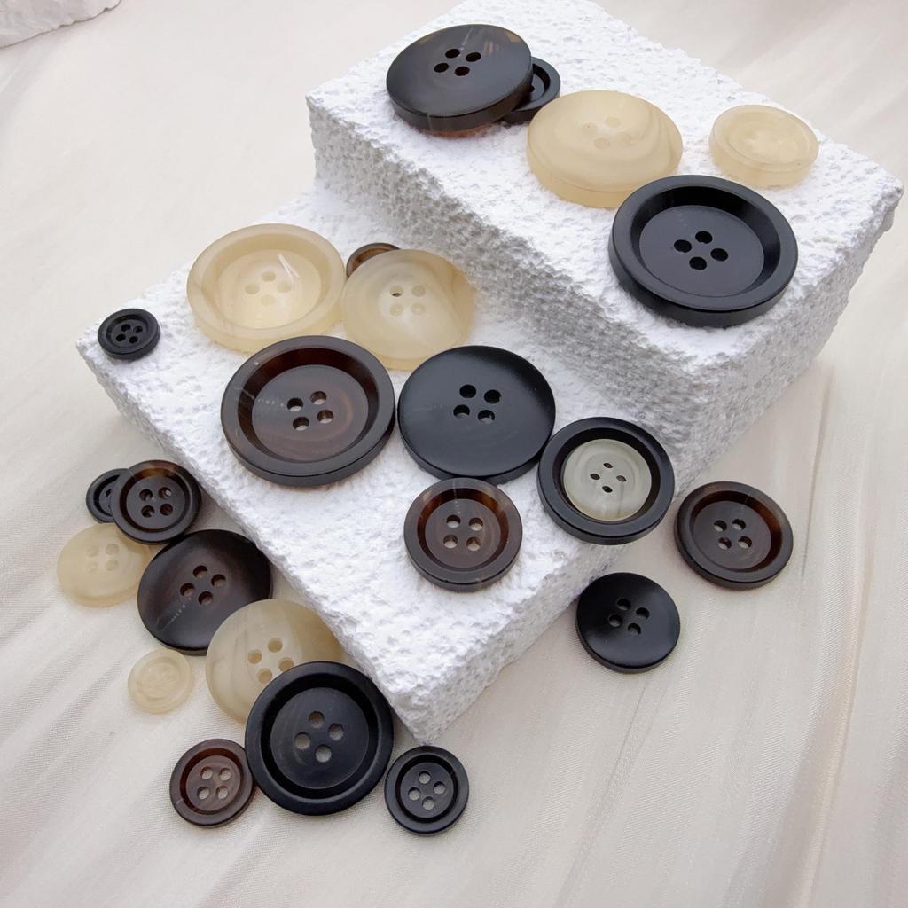 Matte Four-Hole Resin Cow Horn Pattern Buttons for Coats, Windbreakers, Suits, and Trousers
