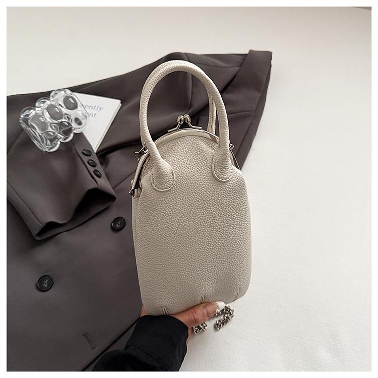 

2025 spring new bag women s fashion versatile simple texture shoulder messenger bag commute clip bag