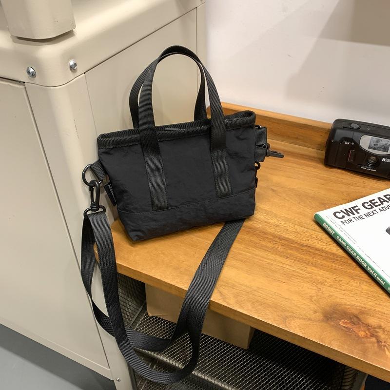 Crossbody bag women's small bag 2025 new foreign style personalized solid color portable simple shoulder bag trendy casual bucket bag