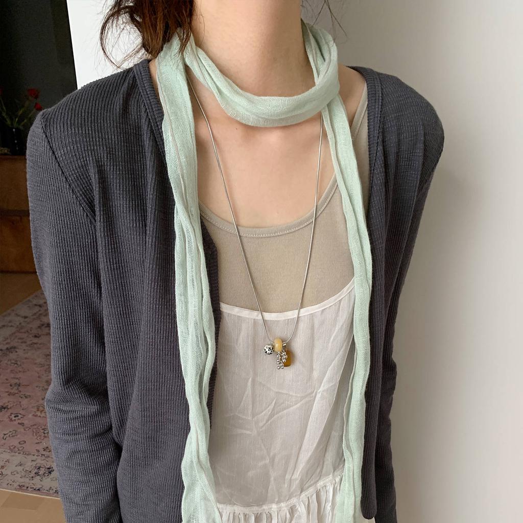A sophisticated long polka dot silk scarf for women, a versatile necktie ribbon, a niche vintage thin scarf with ribbons