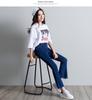 Women's Korean Style High-Waisted Cropped Flare Jeans with Slimming Stretch and Fringe Hem.