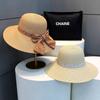 Hepburn style straw hat seaside vacation sun hat summer straw braided big brim temperament bow sun hat women's