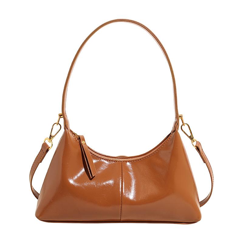 

French niche retro single shoulder underarm bag women s 2025 summer new temperament simple urban commuter style messenger bag коричневый