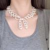 Handmade Pearl Necklace with Bow Clavicle Chain - Light Luxury Design for Women