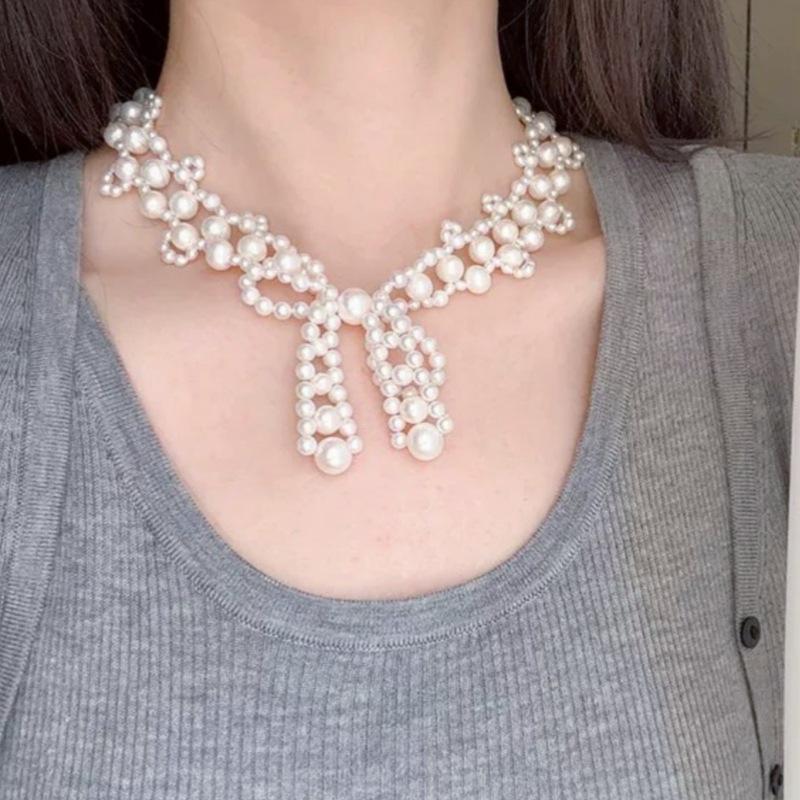 Handmade Pearl Necklace with Bow Clavicle Chain - Light Luxury Design for Women