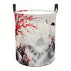 A Stylish Round Laundry Basket with Swan And Cherry Blossom Designs In a 2D Plane - a Decorative Storage Basket for Home, Dorm, Bedroom, And Bathroom 
