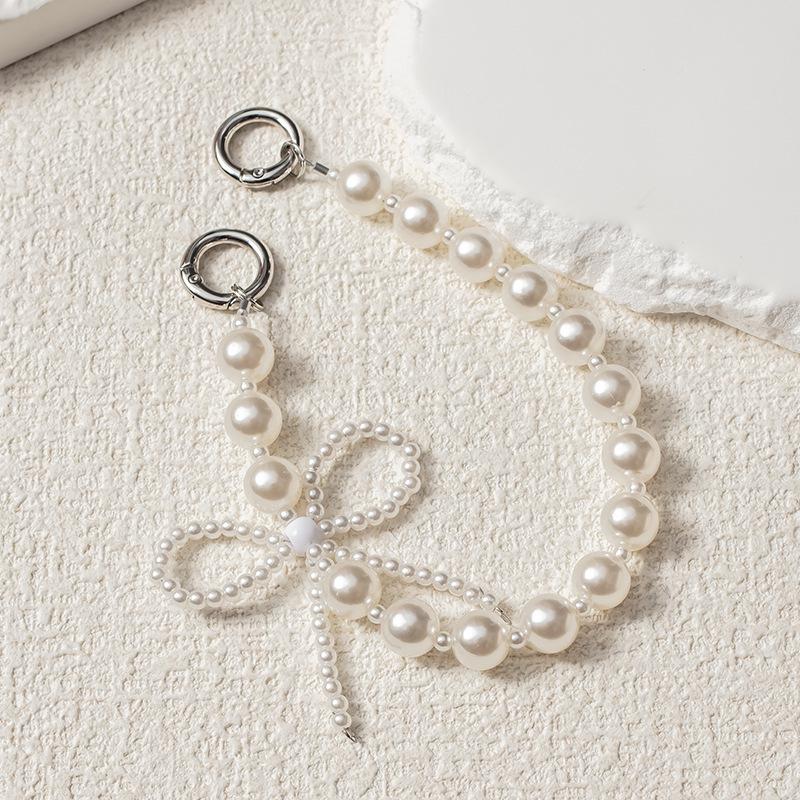 

Жемчужный шнурок для телефона: Трендовый универсальный ремешок на запястье в стиле TikTok Pearl Chain