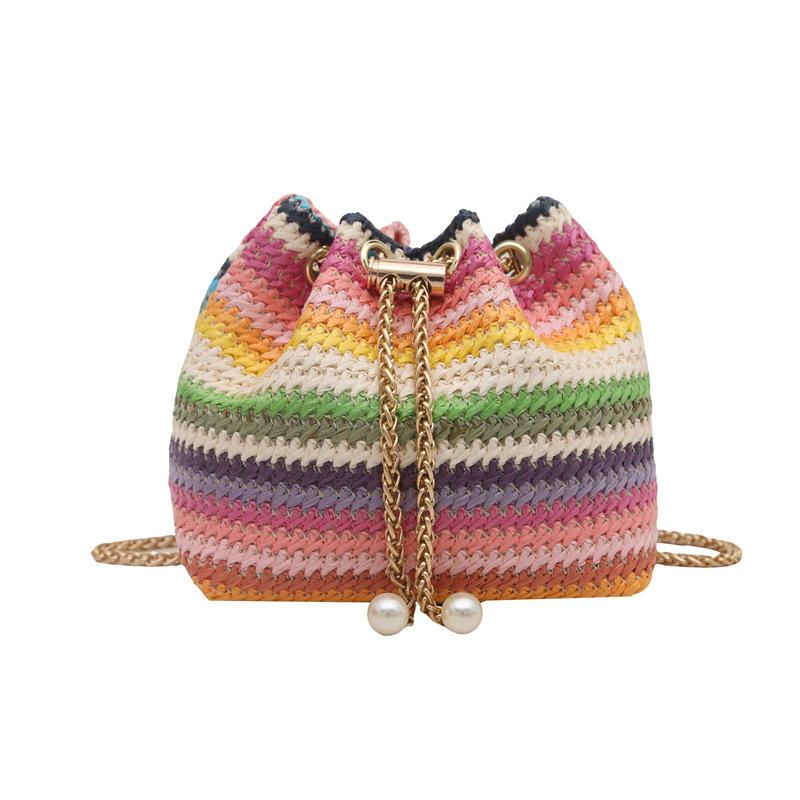 Modische ethnische Stil Stroh gewebte Eimer Tasche Damen Tasche Sommer Neu Kontrastfarbe Umhängetasche Trendige Kette Umhängetasche