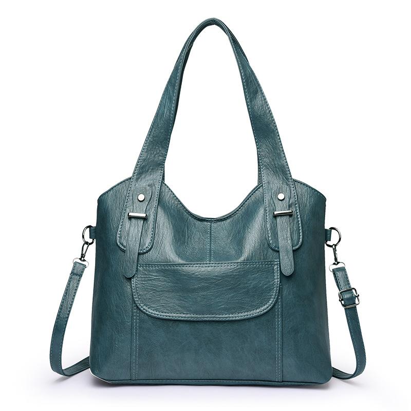 

Winter new large-capacity portable shoulder bag trendy soft leather texture middle-aged women s mother bag messenger bag синій