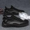 Frühling neue Herrenschuhe atmungsaktives Mesh Fly-Woven Freizeitschuhe vielseitige Lauf-Sportschuhe trendige Kokosnuss-Schuhe