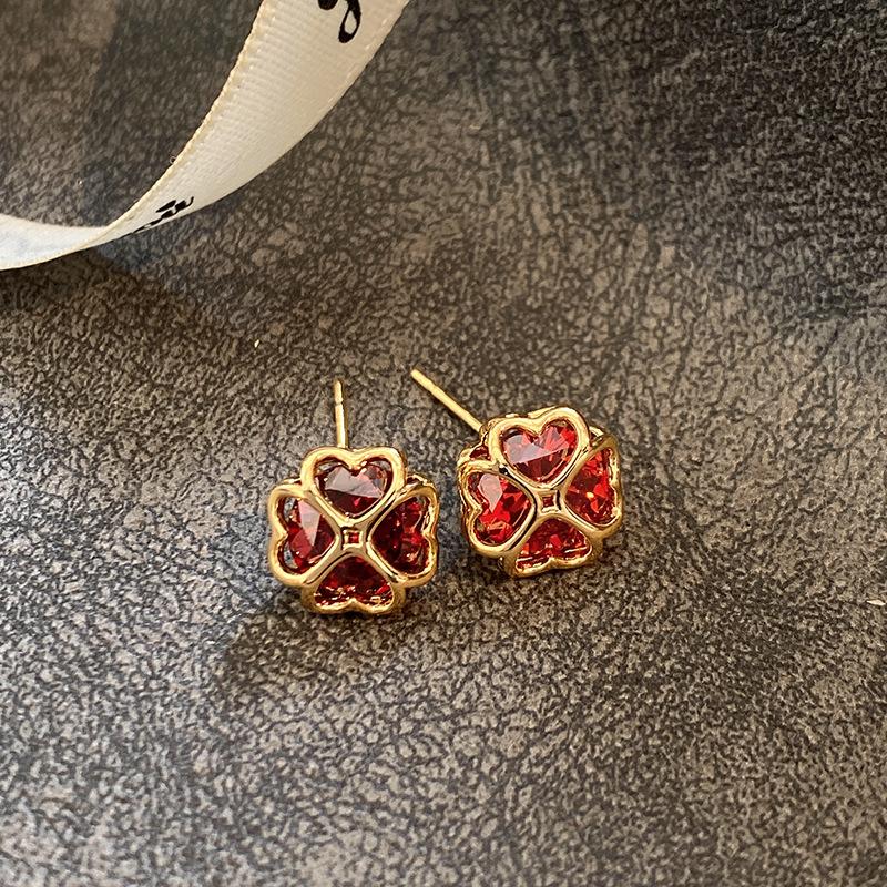

European and American diamond-encrusted colored flower A-grade zircon stud earrings, unique design hollow small exquisite earrings, commuter earrings