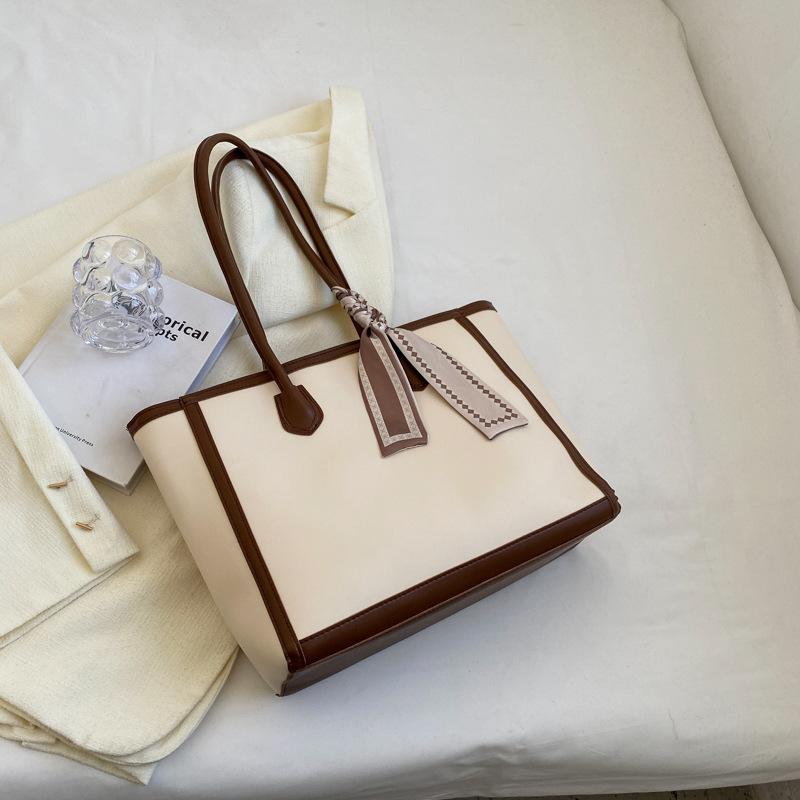 Contrasting color large-capacity bag women's 2025 new summer fashion texture commuter bag versatile shoulder bag shopping bag