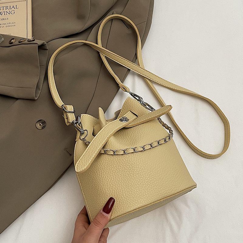 

Трендовые новинки, высококачественная портативная сумка-ведро с узором личи, женская для поездок на работу, простая стильная универсальная сумка-мессенджер для мамы и ребенка