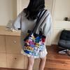 2025 summer contrasting colors Korean version fashionable new handbag bucket bag graffiti handheld lady bag make-up bag to work
